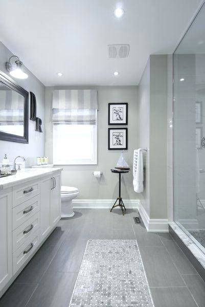 dark grey floor tiles, large wall mirror, two white sinks, inbuilt bath  with Bathrooms Without Tiles – 50 Alternative Design Ideas