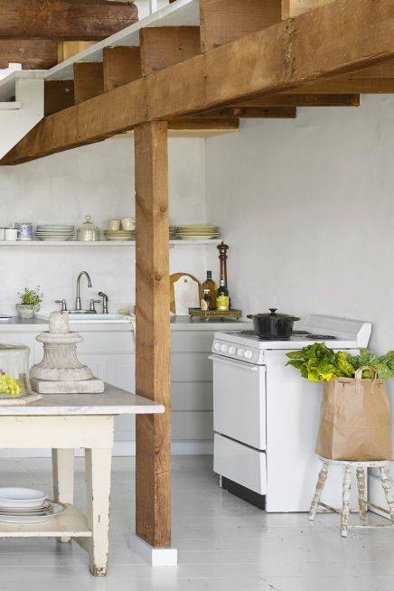 White Harmony inset cabinets with a gray kitchen island