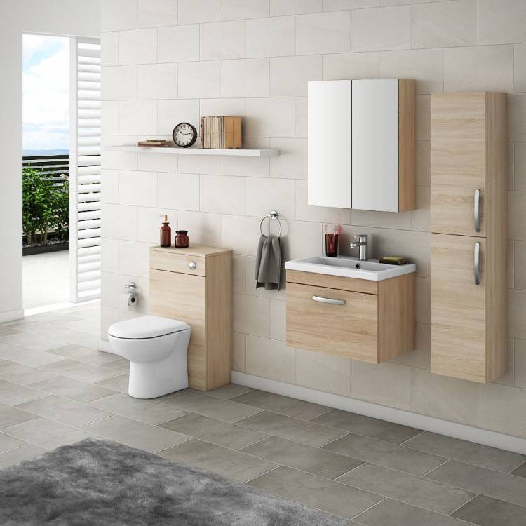 Bathroom with oak vanity, oak trim and door