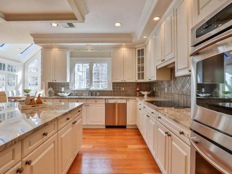 Black cabinets with faux distressing