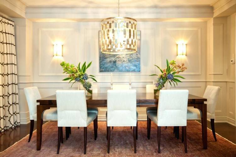 Transitional dining room with tiled floor and chandelier