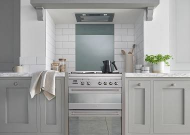 Herringbone tiles create a stylish look in this modern kitchen