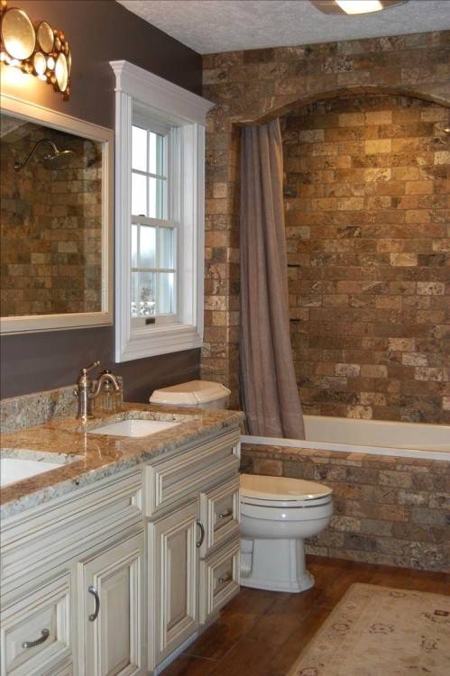 Custom copper bathtub and stone backdrop steal the show here [From:  Diamond Spas]