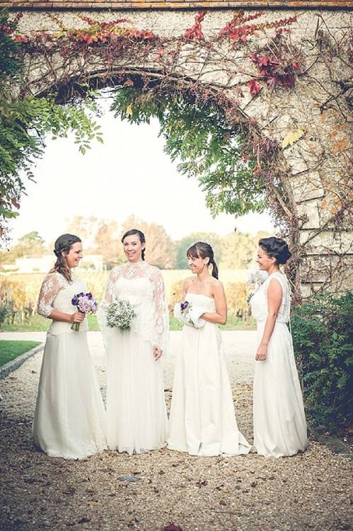 Beautiful blonde young bride woman in color wedding dress