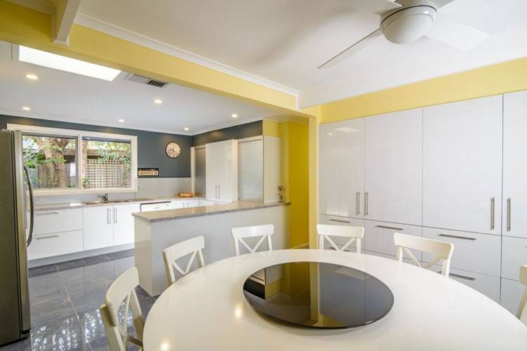 Kitchen Designs from the Mooroolbark renovation featuring Caesarstone benchtops, emporite gloss paint finish, roller