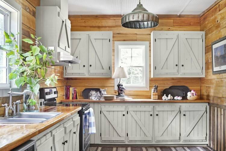 Cherry cabinets with a gray kitchen island