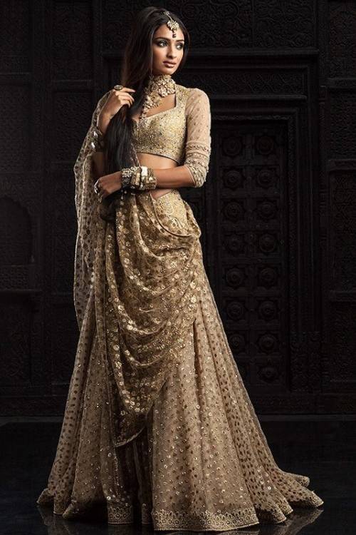 The traditional wedding dress is a Saree or Lehenga