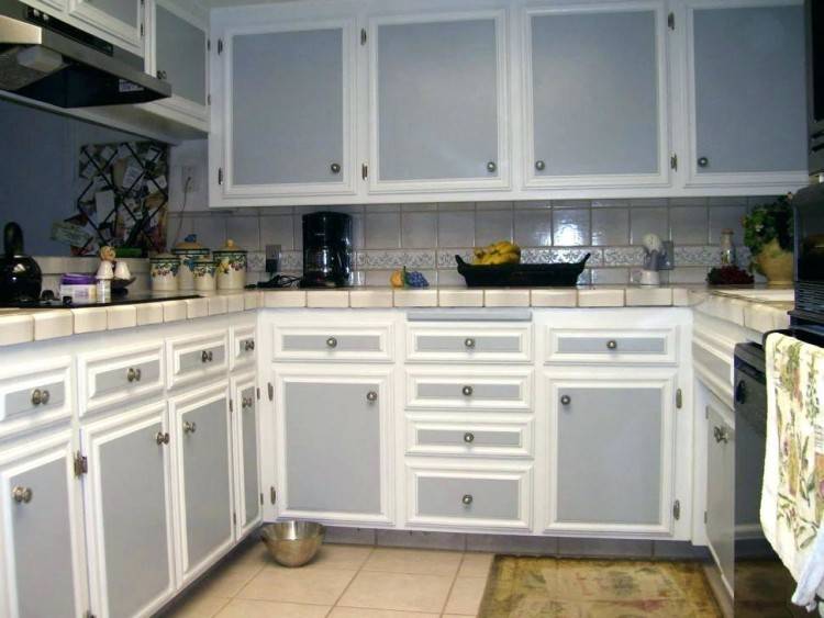 Two tone kitchen with gray cabinets and a white island