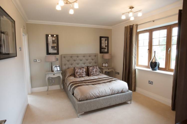 bedroom with upholstered headboard