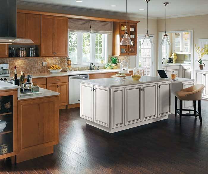 Dining room cabinets in light grey finish by Kitchen Craft Cabinetry