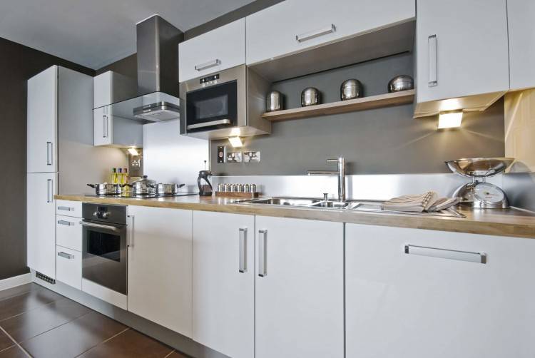 Two tone kitchen cabinets have become a trend that swept hundreds of homeowners off their feet