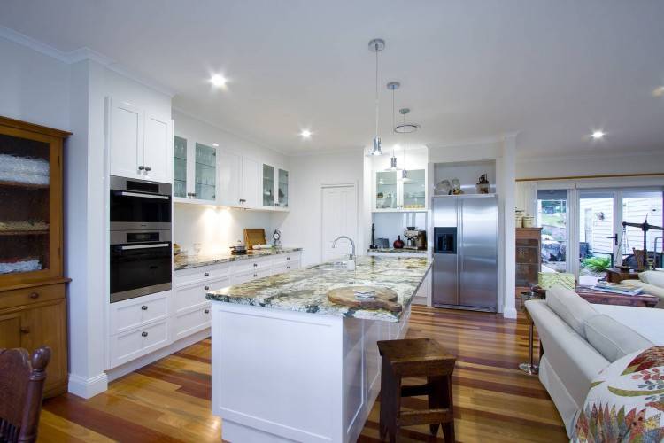 The large bifold doors create another living area externally that becomes integrated with the kitchen space