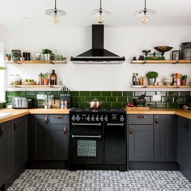 A light wood floor and white tile backsplash will help brighten the room  while allowing gray cabinets to become the centerpiece of the design