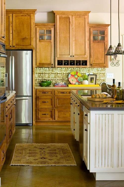 Riff kitchen cabinets in maple pure white with a walnut island in walnut natural