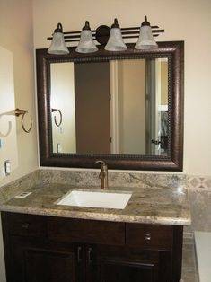 Love the large mirror over the sink and toliet