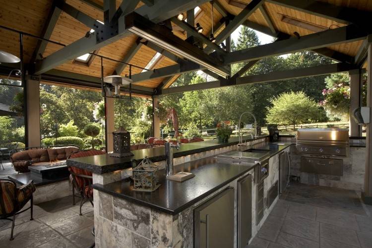 brick and reclaimed wood is used  throughout this outdoor living space