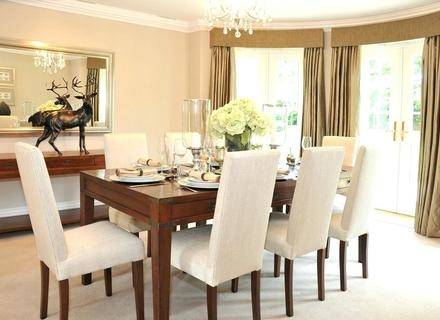 Banquette and bamboo roman shades for nook in living room contemporary dining room by Michael Fullen Design Group