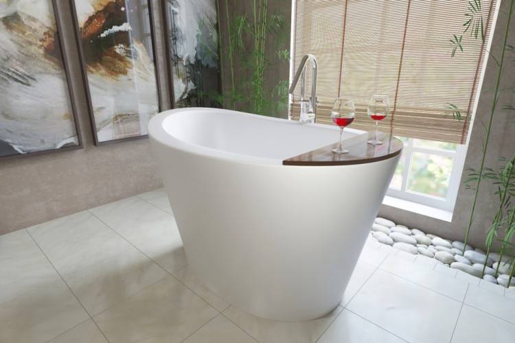 Bathroom design featuring a freestanding tub