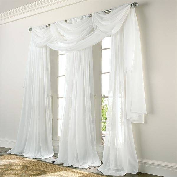 A dainty cafe curtain or half curtain is the perfect solution for a kitchen window