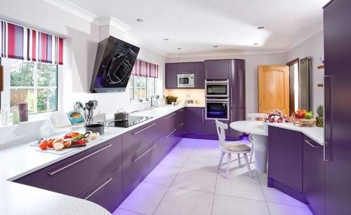 Transitional purple kitchen with marble counters