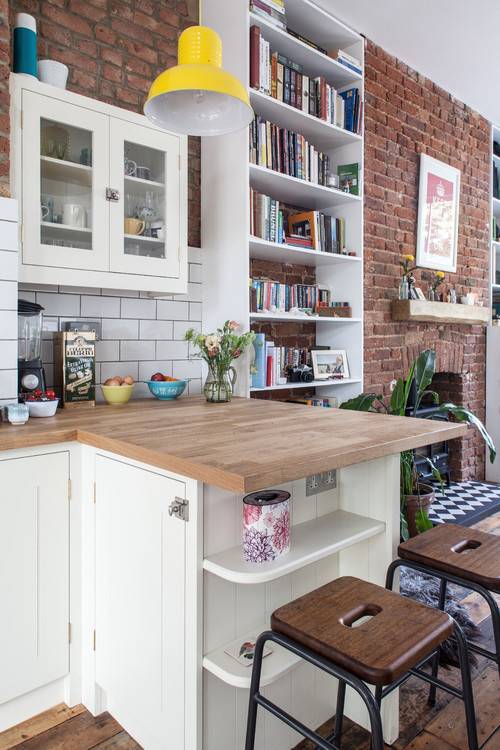 Gorgeous galley kitchen with appliances on the counter for regular use