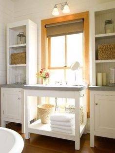 Window Dressing A kitchen with windows offers an opportunity to incorporate storage in unexpected ways