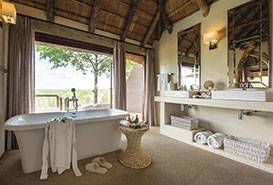 South African Antiques Kambaku Accomodation Spacious bathroom facilities with outdoor showers and separate