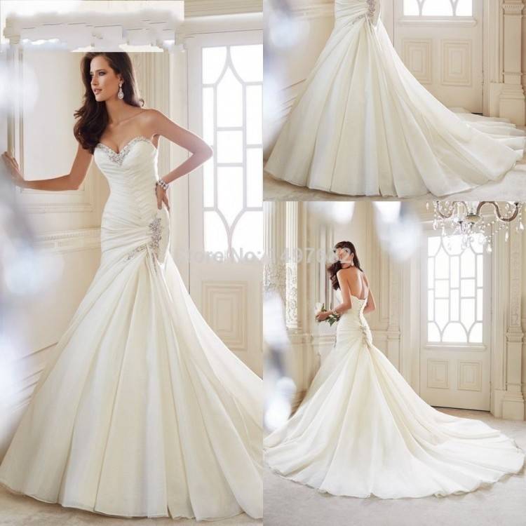 Style #1800L, satin ball gown wedding dress, designed with illusion plunging neckline,