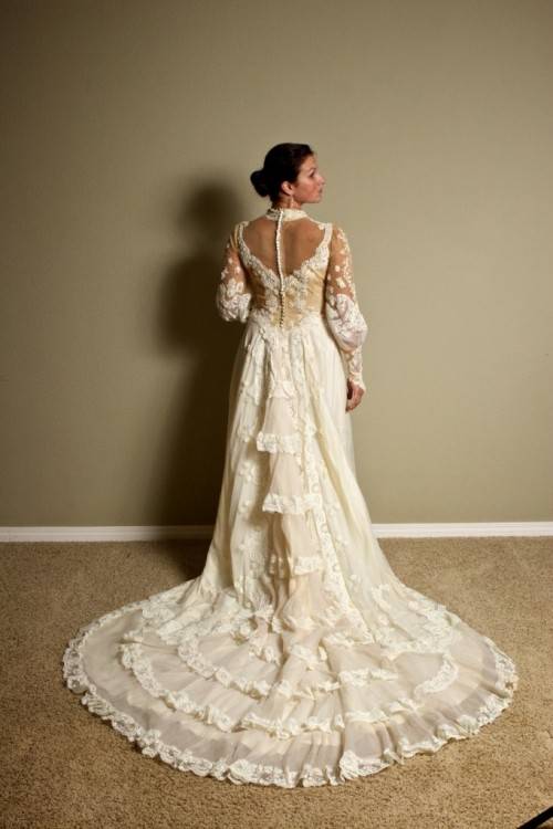 white victorian style wedding gown with train