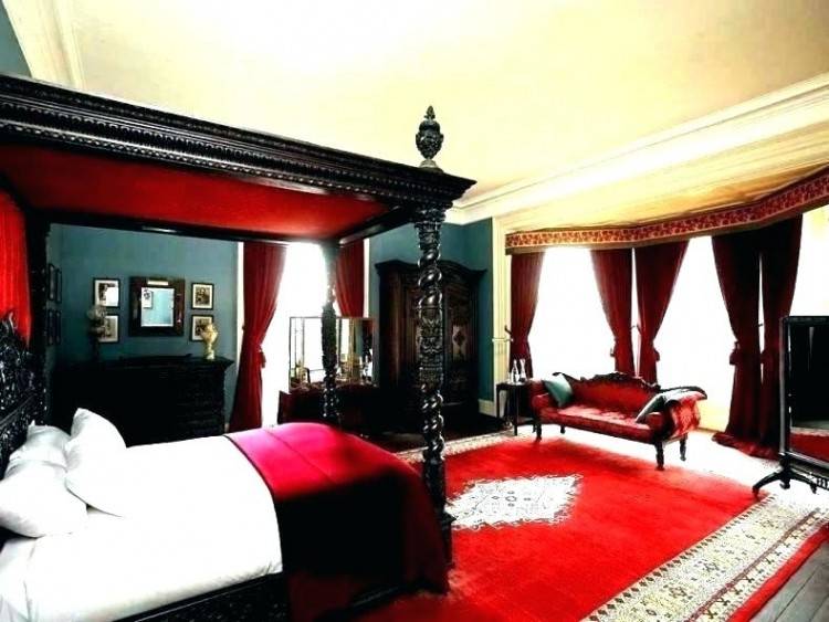 Red bedroom walls,& padded headboard, black bedding & accessories